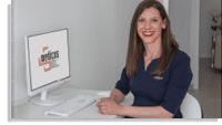 Endocrinology doctor smiling at the camera in her office