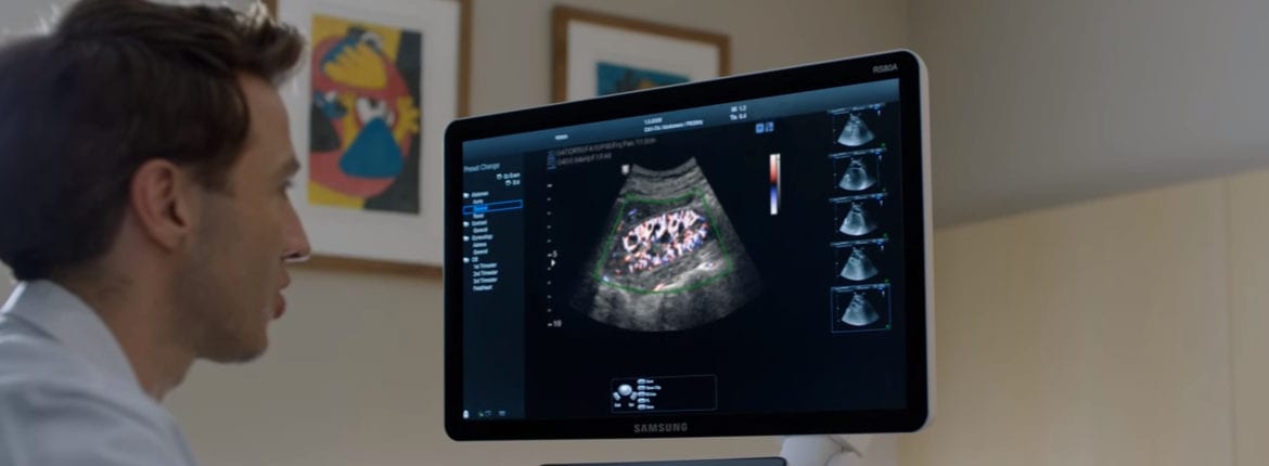 samsung_ultrasonic doctor looking at the imaging of an ultrasonic scan