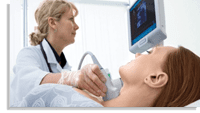 surgery-thyroid-and-endocrine-glands doctor checking womans throat for thyroid